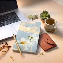 Load image into Gallery viewer, Write Now Journal - More Simplicity, More Ease, More Softness, More Light on a table next to a computer and pencil