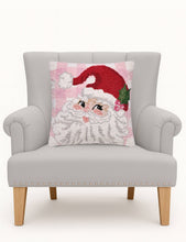 Load image into Gallery viewer, Whimsy Christmas Santa Hook Pillow on a chair
