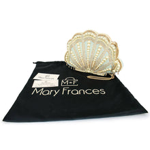 Load image into Gallery viewer, scalloped sea shell shaped hand bag heavily beaded with blue and gold beads and pearls and a black Mary Frances branded protective bag