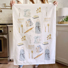 Load image into Gallery viewer, person holding the Baking Tea Towel to show all images on the towel