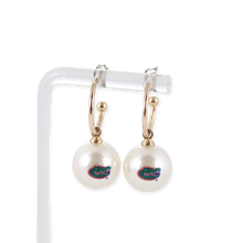 Load image into Gallery viewer, Florida Gator Pearl Hoop Earrings on earring display stand