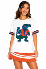 Load image into Gallery viewer, person wearing Florida Sparkle Logo T-Shirt showing sequins in design