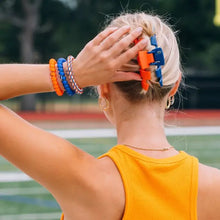 Load image into Gallery viewer, person wearing Orange and blue hair clips