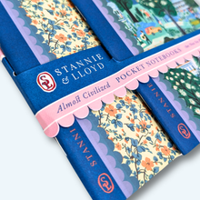 Load image into Gallery viewer, close up of the staple binding