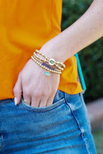 Load image into Gallery viewer, person wearing gator bracelets