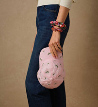Load image into Gallery viewer, person holding the Rifle Paper Pink Hydrangea Baseball Cap
