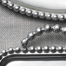 Load image into Gallery viewer, close up Mariposa Pearled Oval Platter border