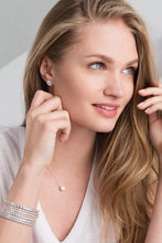 Load image into Gallery viewer, person wearing Crislu necklace, earrings and bangles