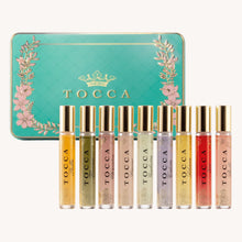 Load image into Gallery viewer, TOCCA Luxury Fragrance nine fragrances next to blue box
