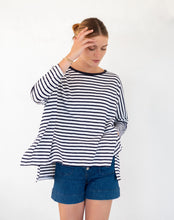 Load image into Gallery viewer, person wearing Mersea Catalina Slub Stripe Ringer Tee white and navy paired with blue shorts