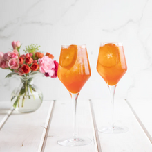 Load image into Gallery viewer, Vietri Contessa Clear Wine Glass with orange drink