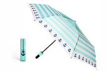Load image into Gallery viewer, Seaside Bottle Umbrella open showing blue stripes and anchor