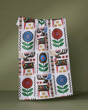 Load image into Gallery viewer, Geometry Folk Deer Tea Towel handing from twine with a stack of clean dishes next to it
