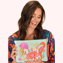 Load image into Gallery viewer, person holding a Velvet Zip Pouch - Seashore Friends - Aqua
