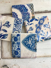 Load image into Gallery viewer, four coasters with blue and cream floral designs
