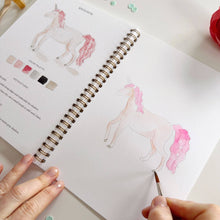 Load image into Gallery viewer, person painting a unicorns hoof
