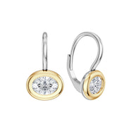 oval shaped cubic zirconia stones surrounded by gold on a platinum lever back hook
