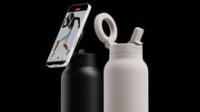 Load image into Gallery viewer, Ringo Pro Regular (24oz) Water Bottles one is holding a phone
