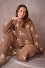 Load image into Gallery viewer, Woman sitting in the brown and tan Horse Sweater Lounge Set 
