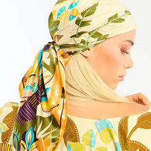 Load image into Gallery viewer, person wearing a Hawaii Golden Med Scarf on their head
