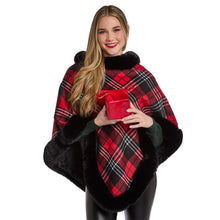 Load image into Gallery viewer, person wearing Plaid Poncho with black trim along hem and neckline
