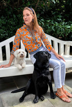 Load image into Gallery viewer, person in Gretchen Scott Designs Stunning Stippling Boyfriend Shirt  sitting on a bench with two dogs
