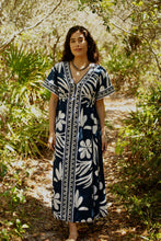 Load image into Gallery viewer,  woman wearing the woman in Cora Caftan in the woods
