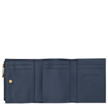 Load image into Gallery viewer, open navy blue wallet showing pockets and gold zipper
