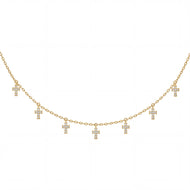 gold chain with 7 small crosses dangling from it
