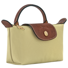 Load image into Gallery viewer, close up of Longchamp Le Pliage Original Pouch w/ Handle - Pistachio showing width

