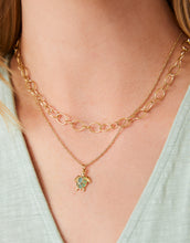 Load image into Gallery viewer, person wearing gold jewelry

