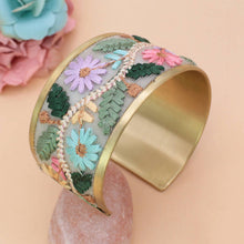 Load image into Gallery viewer, Decorative bracelet with floral patterns on a beige background
