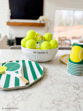 Load image into Gallery viewer, Tennis Light-Up Sitter at center of a bowl 
