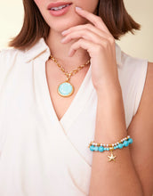 Load image into Gallery viewer, person wearing a Karina Round Necklace 19" Ocean Blue
