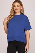 Load image into Gallery viewer, woman in Drop Half Sleeve Crew Neck Sweater Top paired with black pants rib knit along neck sleeves and hem
