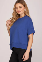 Load image into Gallery viewer, woman in Drop Half Sleeve Crew Neck Sweater Top paired with black pants rib knit along neck sleeves and hem side view
