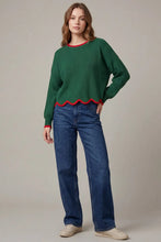 Load image into Gallery viewer, woman in the Long Sleeve Scallop Hem Christmas Sweater  - Green paired with blue jeans
