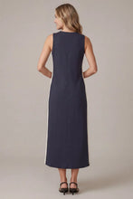 Load image into Gallery viewer, back view long sleeveless dress with a white stripe down the side
