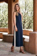 Load image into Gallery viewer, person wearing a long sleeveless dress with a white stripe down the side
