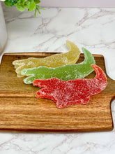 Load image into Gallery viewer, three flavors of Florida Citrus Candy, Alligator Delicacy in red green and yellow
