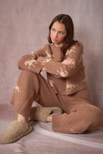 Load image into Gallery viewer, Woman sitting in the brown and tan Horse Sweater Lounge Set 
