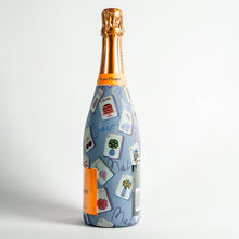 Load image into Gallery viewer, Champagne Bottle covered with the Pastel Blue Mahjong Champagne Bottle Wrap side view
