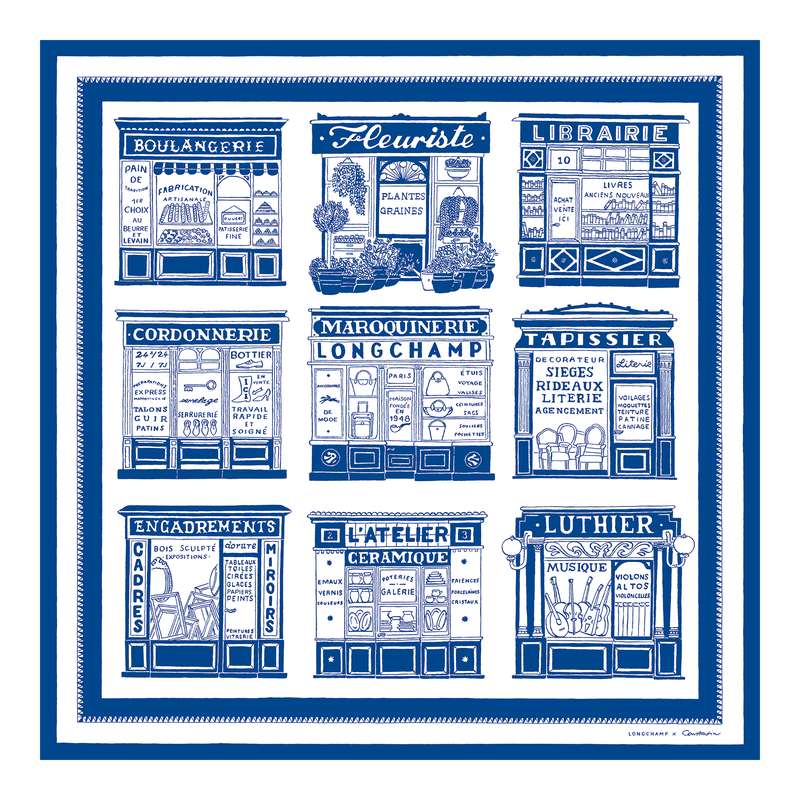 scarf with images of store fronts in blue and white