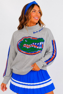 person wearing the Florida Mock Neck Sequin Stripe Sweatshirt