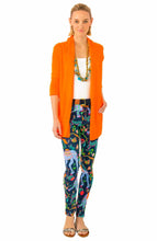 Load image into Gallery viewer, full view woman wearing Gretchen Scott Designs Open Cardigan Sweater with white top and print pants, one hand in the sweater pocket , sleeves are 3/4 length
