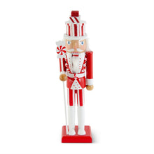 Load image into Gallery viewer, Red and White Wood Nutcracker holding a lollypop 
