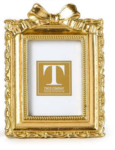 Load image into Gallery viewer, Gold vertical rectangular frame with a bow on top
