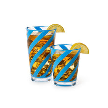 Load image into Gallery viewer, short an tall glass with blue diagonal stripes holding soda
