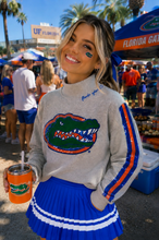 Load image into Gallery viewer, Florida Mock Neck Sequin Stripe Sweatshirt at a gator party
