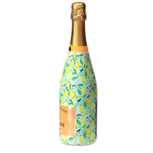 Load image into Gallery viewer, Champagne Bottle covered with the Preppy Lemons Champagne Bottle Wrap side view
